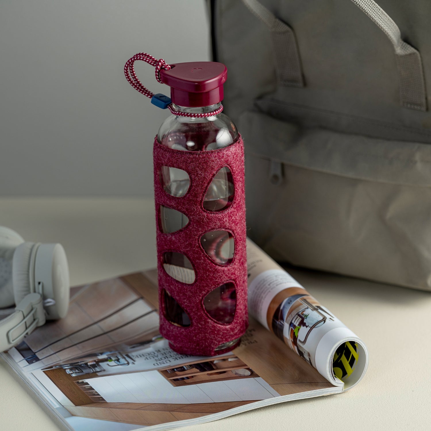 LEONARDO-Trinkflasche IN GIRO aus Glas mit Filzhülle und Schraubverschluss