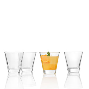 Trinkglas CIAO 215 ml, vier Gläser in einer Reihe, eines mit orangefarbenem Getränk und Minzblatt gefüllt