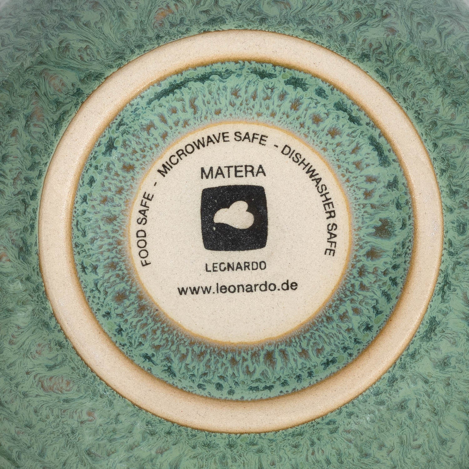 Keramikschale MATERA grün, Unterseite mit Herstellerangaben und Pfleghinweisen