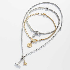 Armband gold ESTRELLA Clip & Mix in verschiedenen Varianten übereinander angeordnet