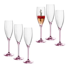 Sektglas POESIA 250ml rosé 6er-Set, eines gefüllt mit Getränk und Kräuter