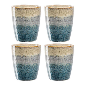 Vier Keramikbecher MATERA mit Farbverlauf von Beige über Grau zu Blau, Draufsicht