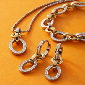 Armband LENA mit Ohrringe bicolor auf orangem Hintergrund