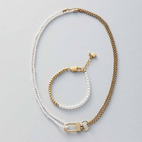 Armband LUCINDA gold mit Perlen und Muschelbestandteilen, Armband und Halskette