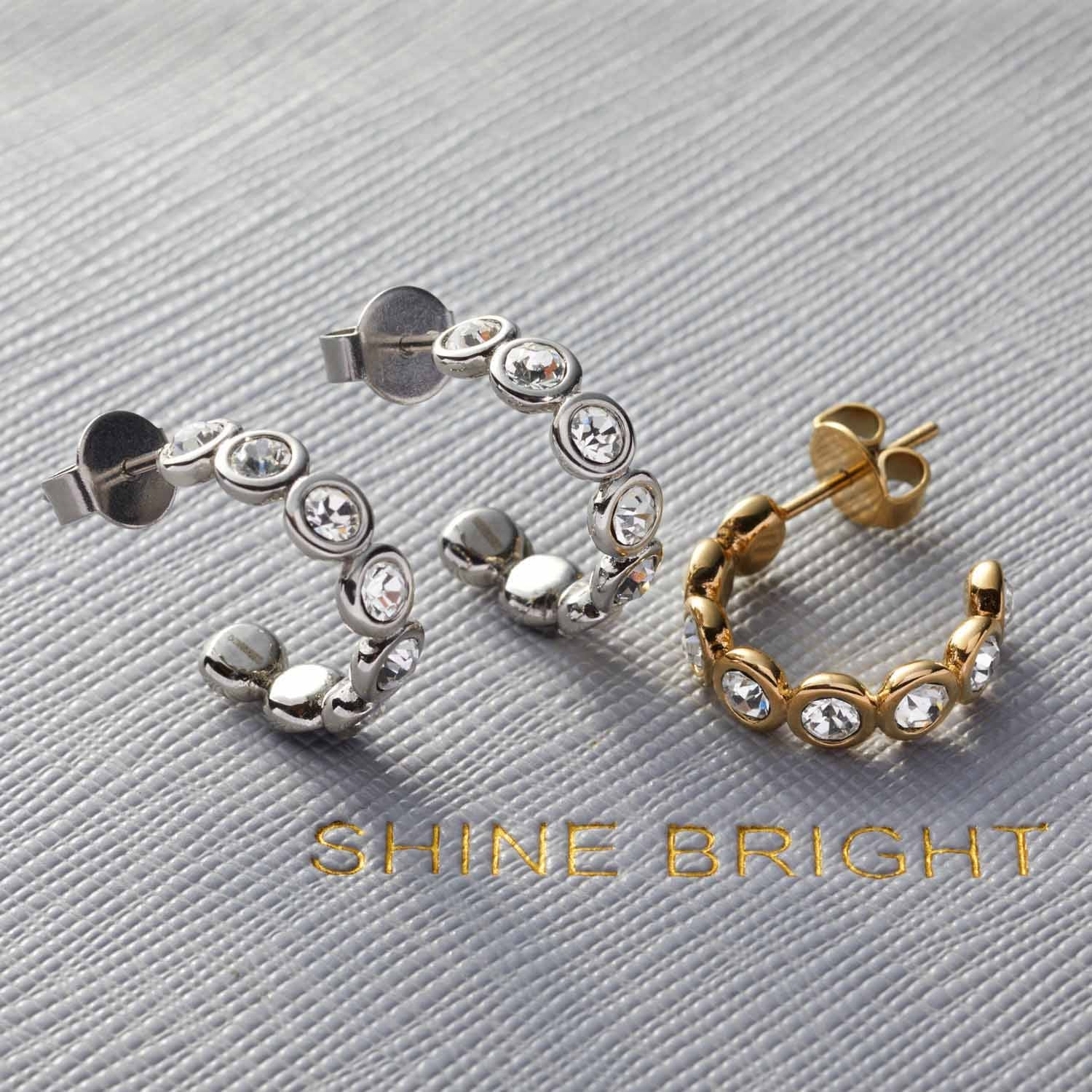 Ohrstecker CREMONA in Silber und Gold mit Zirkonia-Steinen in Reihe angeordnet
