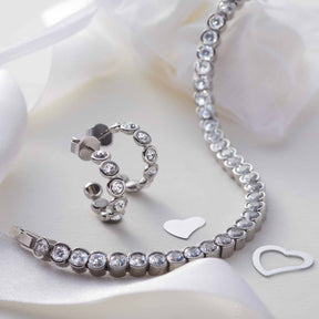 Ohrstecker CREMONA silber und Armband mit Zirkonia auf weißem Untergrund