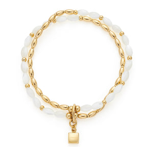 Armband WELDA gold mit weißen Muschelperlen und goldenem Kettenglied mit Anhänger