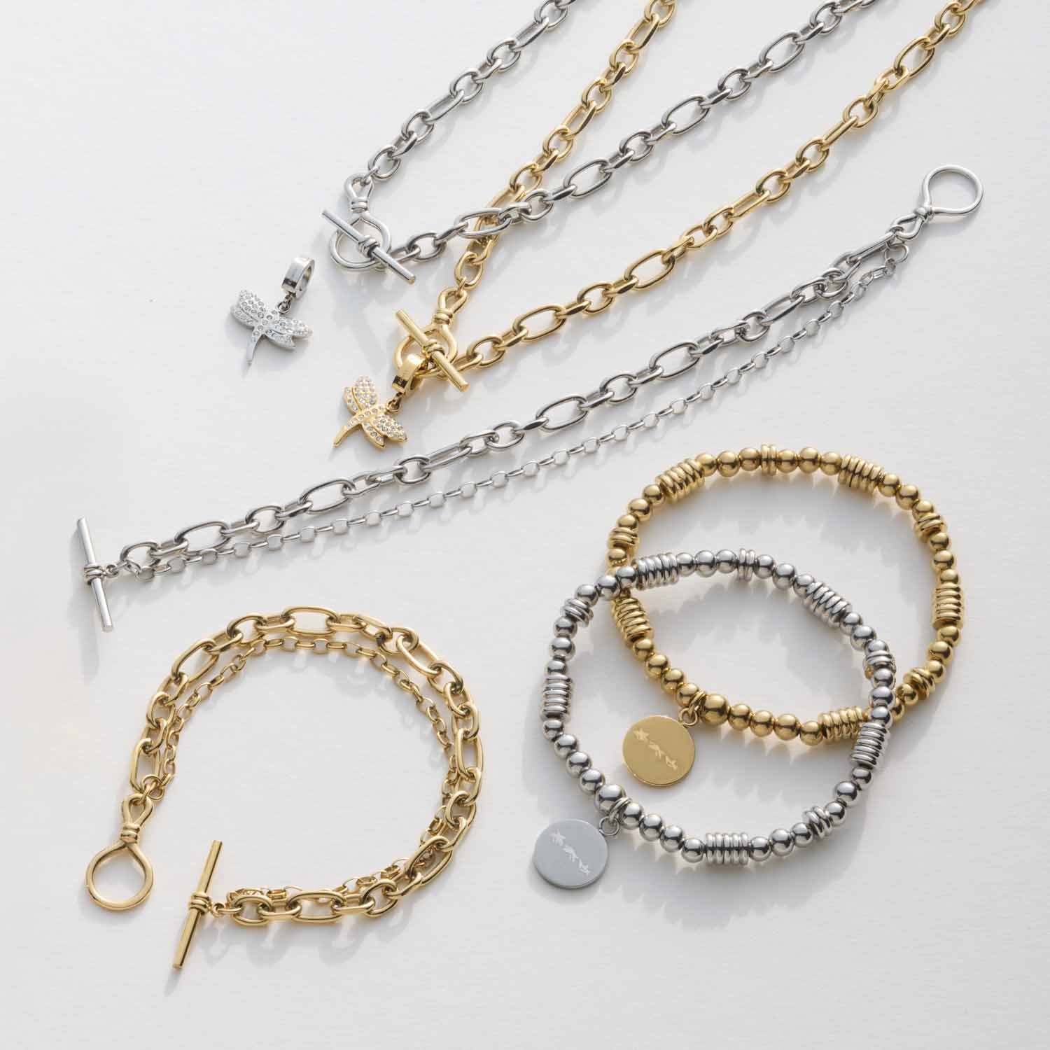 Stretch Armband ELISABETH gold mit Kettenanhängern und Armbändern in Gold- und Silbertönen