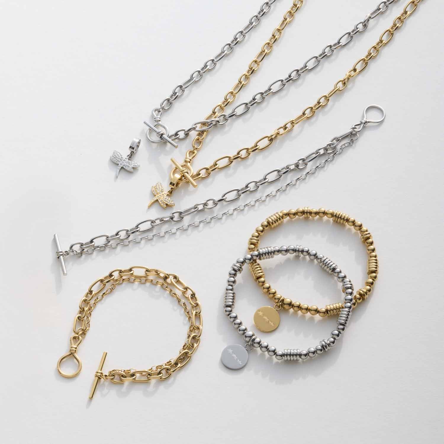 Halskette ELISABETH mit passenden Armbändern in Gold- und Silbertönen auf weißem Hintergrund