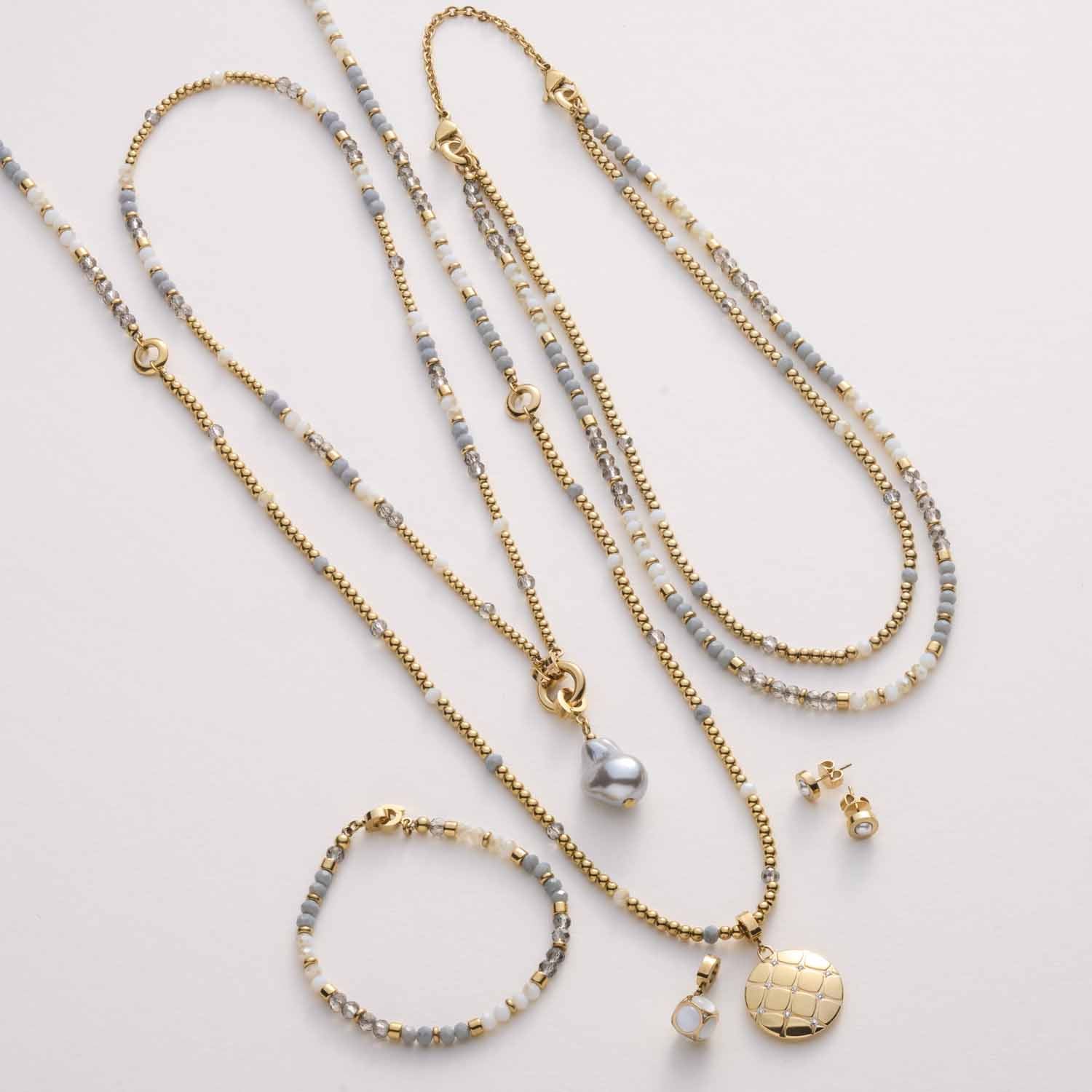 Armband BERNIE Clip & Mix gold mit Glasperlen in Gold- und Silbertönen auf weißem Hintergrund
