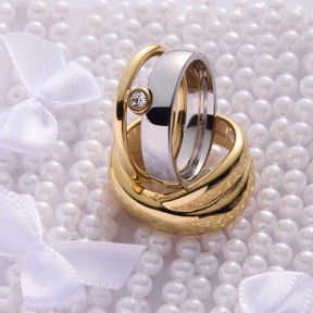 Ring LISBETH 18 gold, Paarring, auf Perlenuntergrund mit Schleife