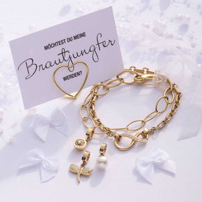 Armband YVETTE gold Clip & Mix mit Charms auf Geschenkkarte