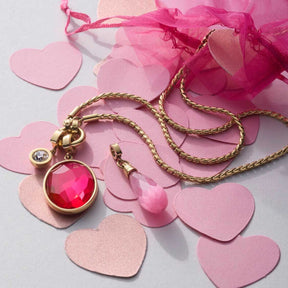 Anhänger FRISCO gold Clip & Mix mit pinkem Stein und Herzcharms
