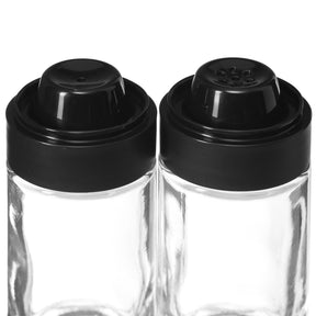 Zwei Salz- & Pfefferstreuer CUCINA 2er-Set aus klarem Glas mit schwarzen Kunststoffdeckeln