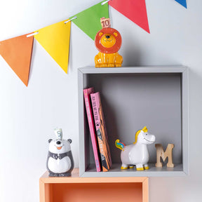 Spardose BAMBINI Einhorn in Kinderzimmer mit Bunting und Spielzeugen