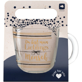 Tasse EMOZIONE mit goldenem Text "Du bist mein Lieblingsmensch" und Schleife, Verpackung