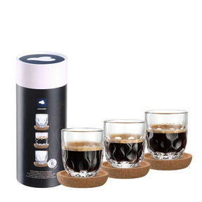 Espressoset GOCCE 6-teilig mit Kaffeemaschine und drei Gläsern auf Korkuntersetzern