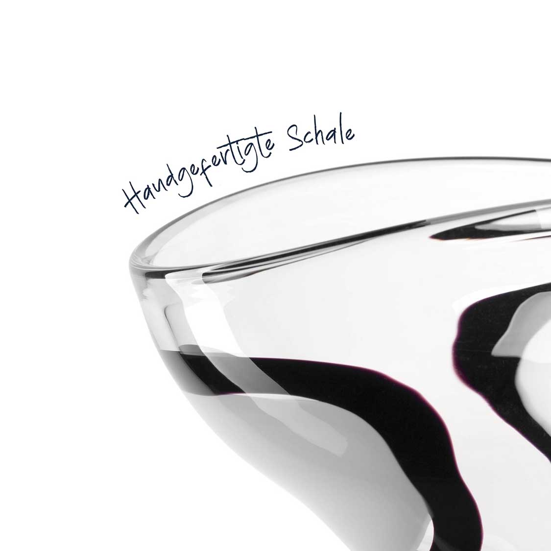 Weiße Glassschale OCCHI BIANCHI mit schwarzem Muster, Handgriffleiste oben sichtbar