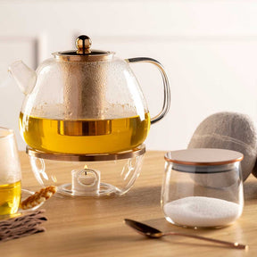 Zuckerdose TÈ PER TE mit Teekanne auf Holztisch, Tasse und Zubehör