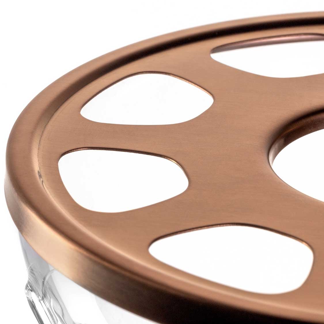 Stövchen TÈ PER TE mit bronzefarbenem Edelstahlring und ovalen Öffnungen, Detailaufnahme