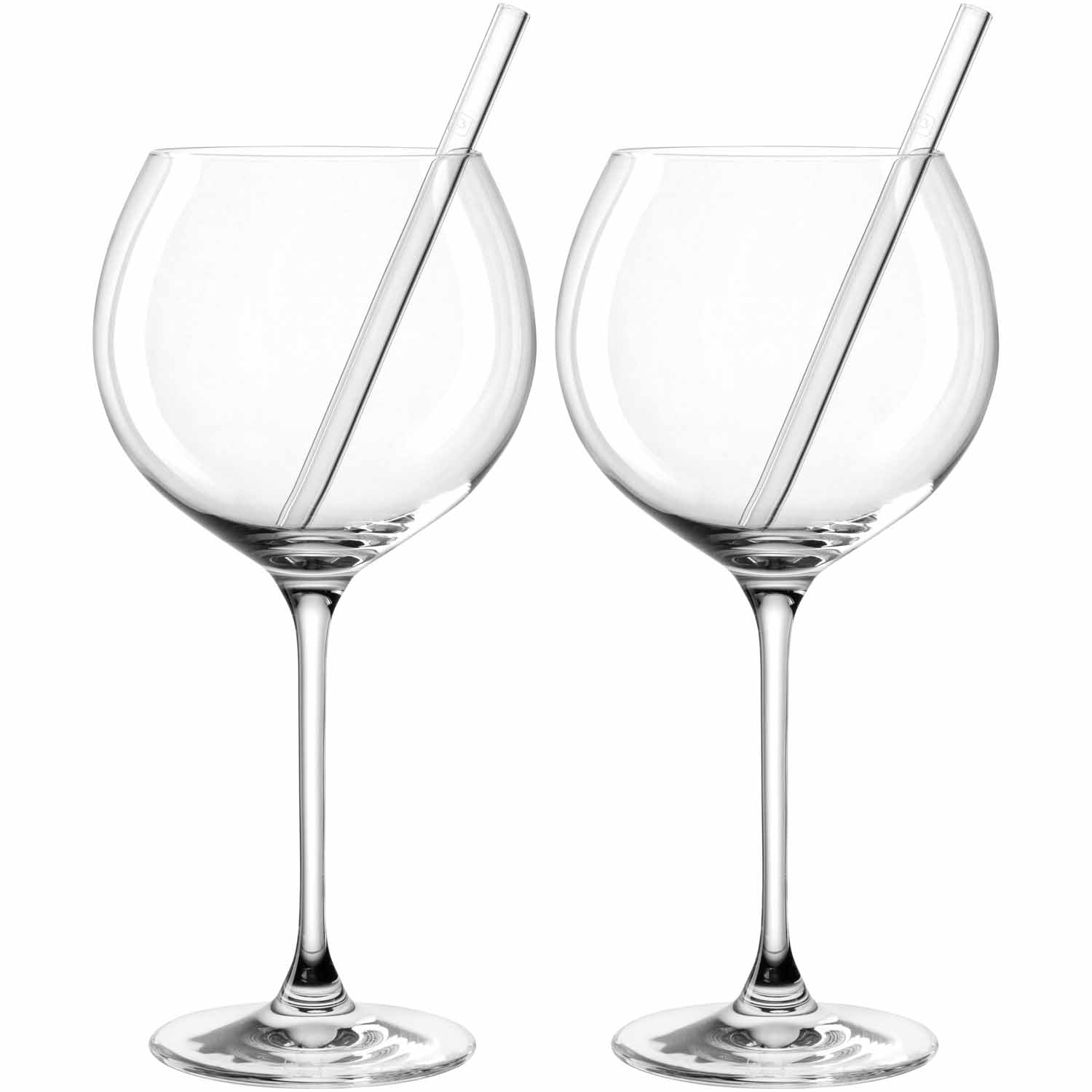 Zwei klare Kelchgläser mit Glastrinkhalmen nebeneinander